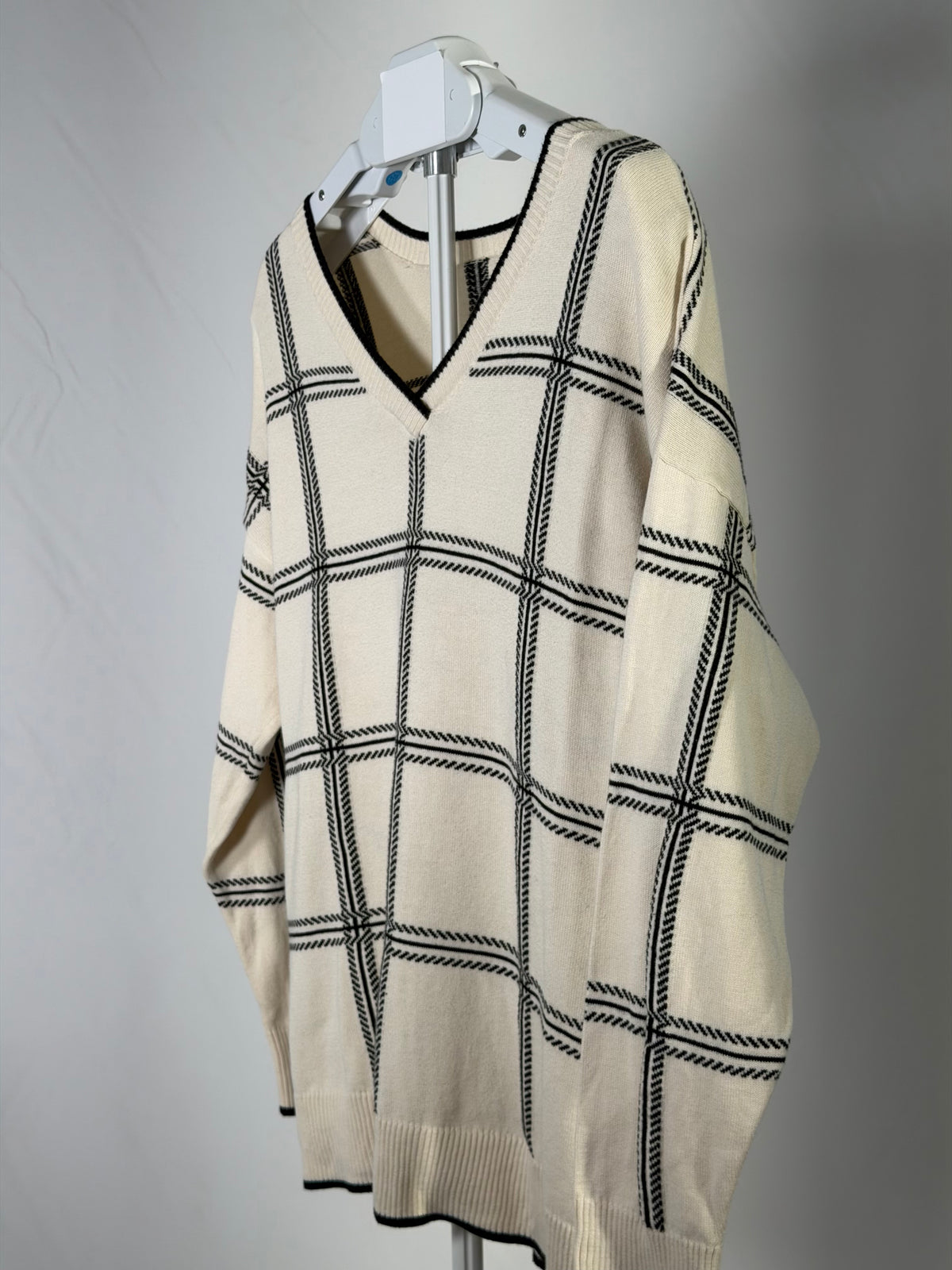Cream and black windowpane grid v-neck slouchy sweater