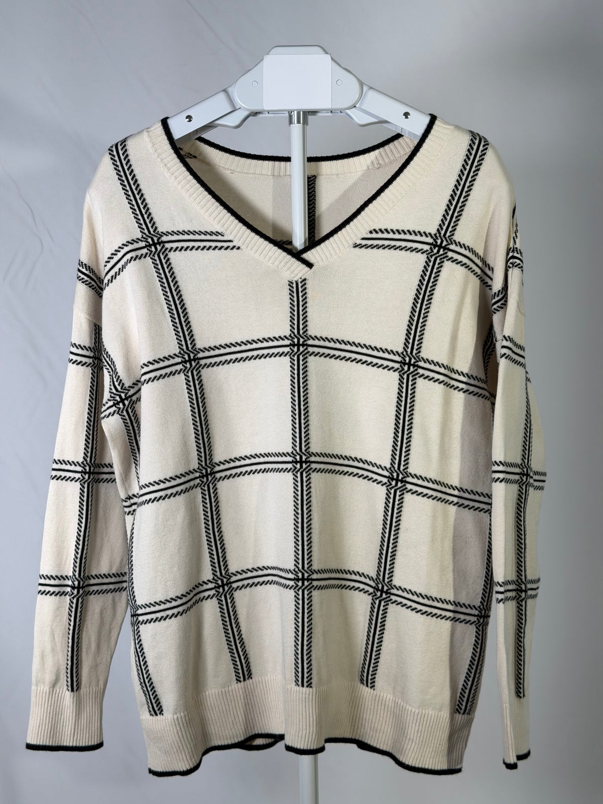 Cream and black windowpane grid v-neck slouchy sweater