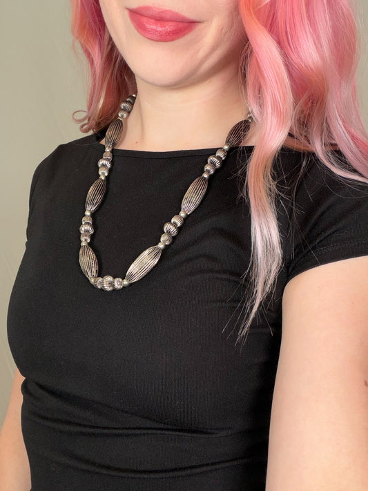 Southwestern style silver tone ribbed bead necklace