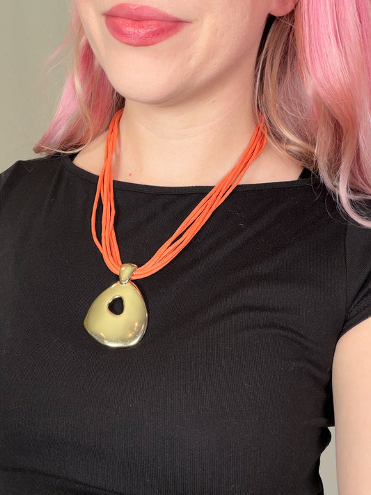 Vintage 80s St. Thomas gold tone pendant orange cord necklace