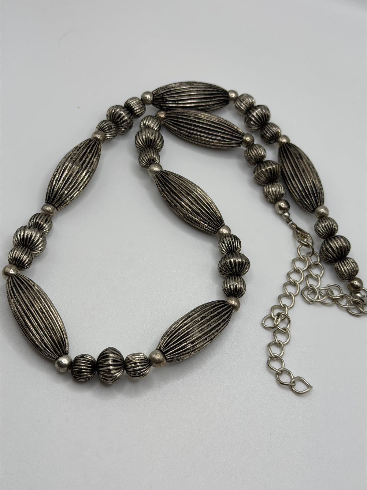 Southwestern style silver tone ribbed bead necklace