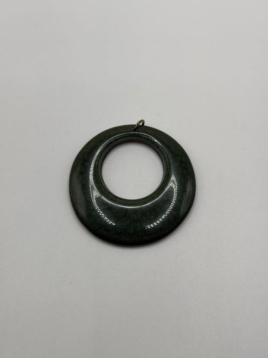 Vintage 70s/80s green speckled enamel donut pendant