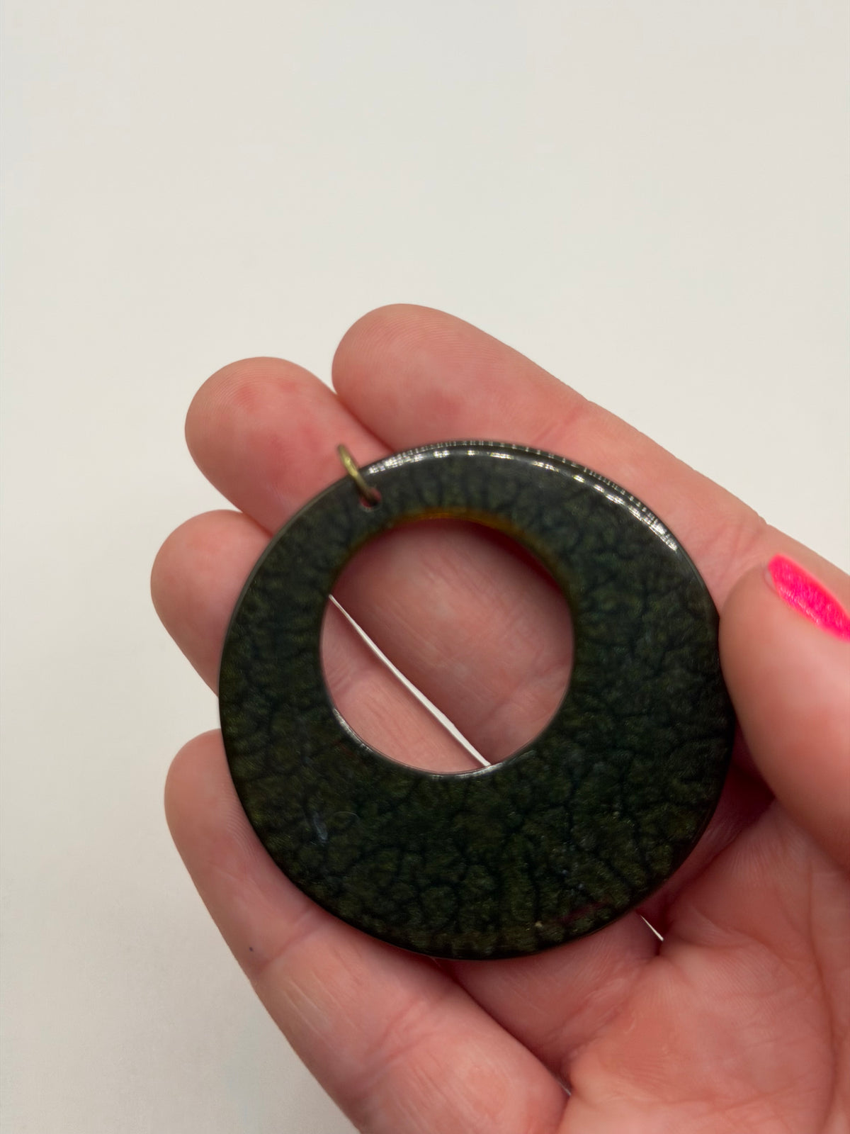 Vintage 70s/80s green speckled enamel donut pendant